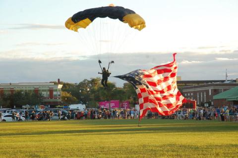 A member of the U.S. Special Operation Command Parachute Team land in downtown Sanford last year at Alive After 5.
