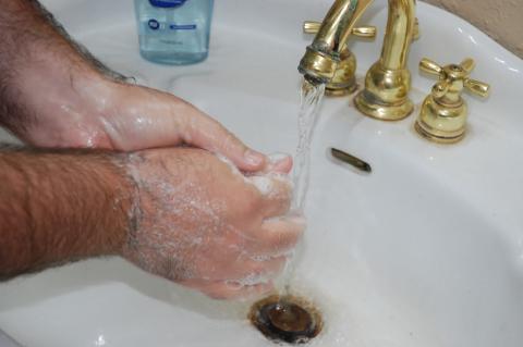 Frequent handwashing (left) is suggested to help with the spread of the virus, which has two confirmed cases within the State of Florida. 