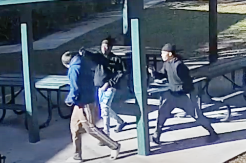Video surveillance from Wes Crile Park (above) shows the moment two teeangers pulled guns on another man during a drug transaction.