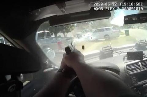Body camera footage from one of the deputies shows him actively shooting through his windshield at Howe, after deputies said he brandished a gun.