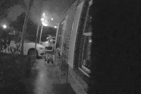 A deputy’s body camera shows Kirk turning the corner of the carport, pointing a gun