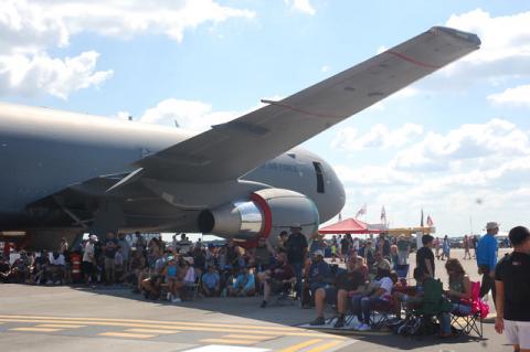Shade was at a premium during the two performances of the Orlando Air and Space Show over the weekend at Orlando Sanford International Airport. But this wing under a military refueling jet on the tarmac at the show provide a bit of respite from the sun.