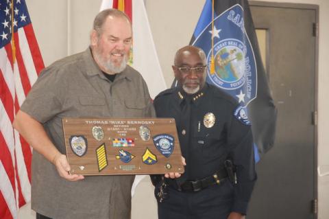 Officer Thomas ‘Mike” Bernosky (left) with Chief Cecil Smith during his retirement ceremony Friday. 