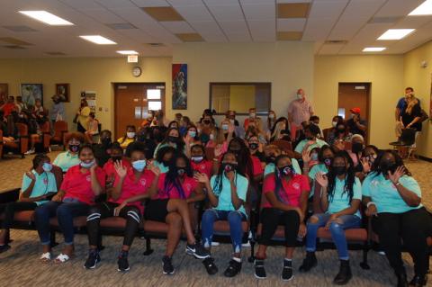  Members and mentors from the Sanford Glorious Hands organization await the arrival of the Sanford City Commission. May 16 was named on Monday night as a Day of Service by Mayor Art Woodruff in honor of the girls mentoring group.