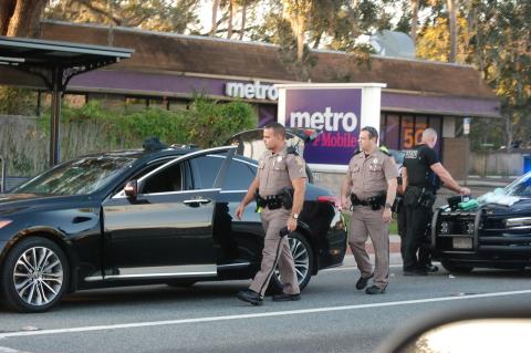 Florida Highway Patrol troopers search the vehicle pulled over at French Avenue and 3rd Street.