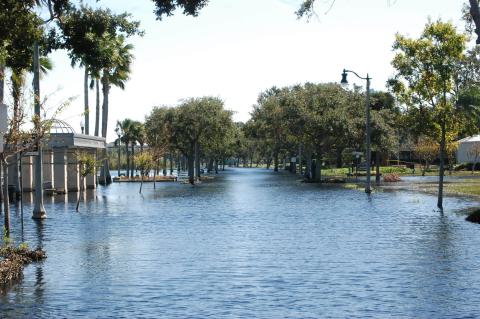 Despite receding waters, Seminole Boulevard (above) remains flooded along Lake Monroe in downtown Sanford. 