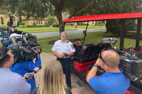 Lt. Tod Zellers, a member of the Seminole County Fire Department’s Special Hazards & Operations Team speaks Thursday morning at the home of the Greer family on Prestige Point in Oviedo about the dangers of golf cart batteries.
