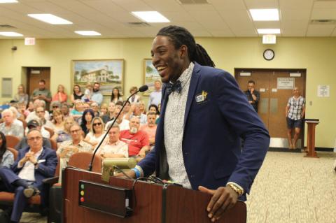 Henry Dorvil spoke at a recent city meeting after returning to Sanford.