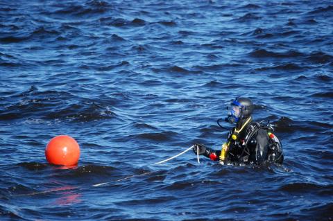Seminole County Sheriff’s Office’s dive teams search Lake Monroe this week for clues in a homicide case. 