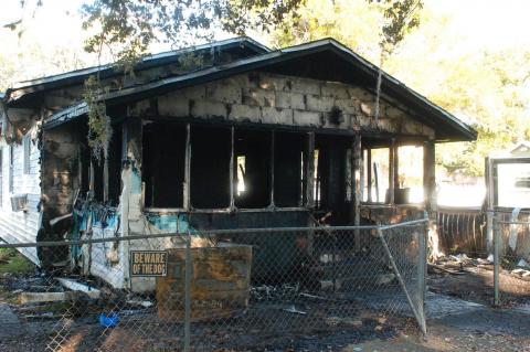 A house fire on Laurel Avenue killed one woman and her two dogs.