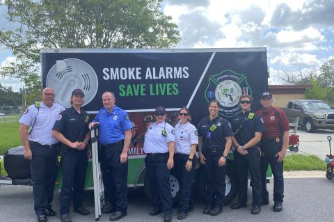 Members of the Seminole County and Sanford fire departments comb the Lincoln Heights neighborhood to inform resident about fire safety and install smoke detectors.