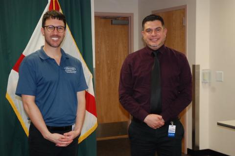 Adam Ledo (left) and Andres Velandia (right) work as a team to interpret Seminole County’s press conferences for the Deaf. Velandia, who is Deaf, translates the conferences into a more gestural language, so it can be broadly understood. 