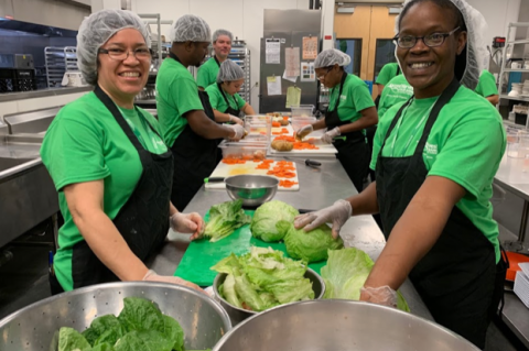Leathea Johnson (right) trains at the Second Harvest Culinary Training Program