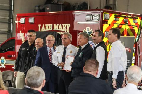 Lake Mary and Seminole County officials celebrate the city’s new Class One rating from the Insurance Services Office during a ceremony at the Lake Mary Municipal Services Complex last week.