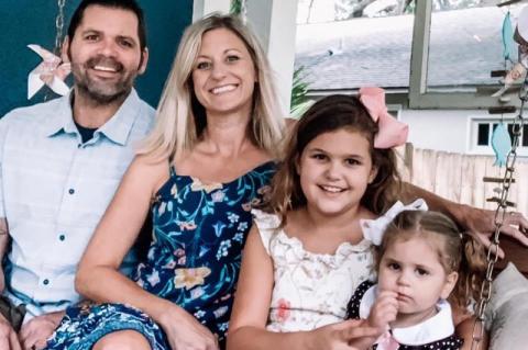 Amanda Butler (second from left) died in a crash involving a motorcycle on May 21. She is pictured with her husband Aaron and two daughters.