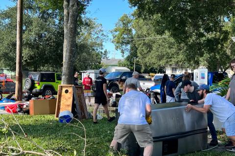 Members of the LifeWay Church near the Kraziese home came to help the day after the flood. The group removed all of the family’s belongings due to water damage from the flood. 