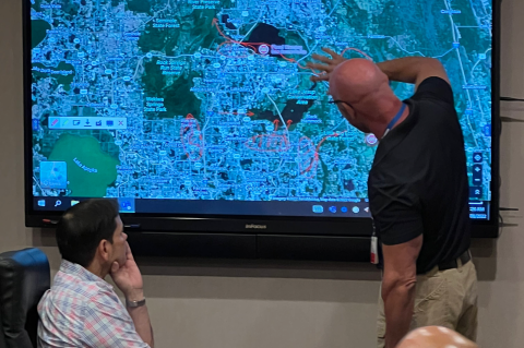 Sen. Marco Rubio (left) watches Seminole County Emergency Manager Alan Harris point out areas affected by Hurricane Ian.