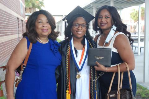 Seminole High 2020 graduate Alice Abia-Okon with mom, Lucy, left, and older sister, Katherine, right.