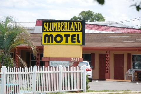 Police and deputies negotiated for hours at the Slumberland Motel (above) before the shootout.