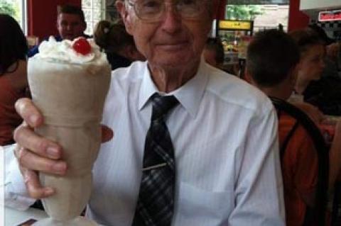 Dr. Robert J. Smith eats his ice cream dessert before his meal, a tradition he insisted on throughout his life. 