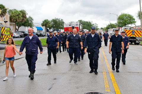 Members of the Seminole County Fire Department (above) are welcomed home after being deplyed to Miami to help with the search and rescue efforts at the collapsed Surfside building. 