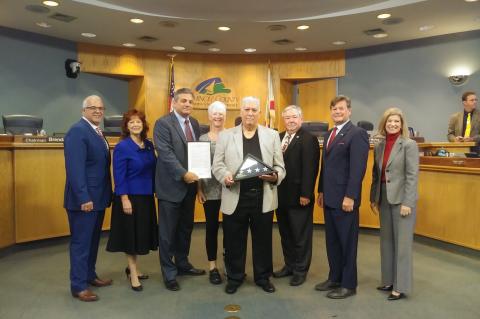 Former Staff Sgt. William E. Waterman Jr. (center) was recognized at a recent Seminole County Commission meeting. 