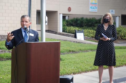 Lui Damiani, executive director of the Victim Service Center of Orlando, speaks to reporters and advocates Wednesday at the Florida Department of Health—Seminole County as Seminole Health Director Donna Walsh looks on.