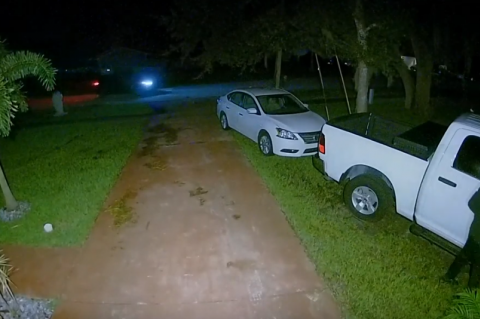 Footage from the Ring Camera shows the suspect attempting to break into a truck parked in the front yard. 