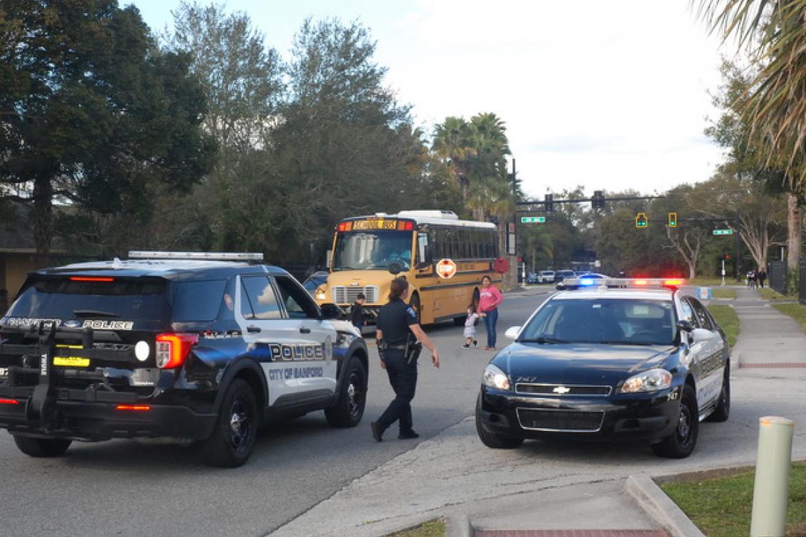 A school bus drops off children on Ridgewood Avenue among the police presence on the road while a shooting investigation took place at Seminole High School last Wednesday. Extra safety precautions have been taken at Seminole High since the shooting and mental health counselors have been on-hand.